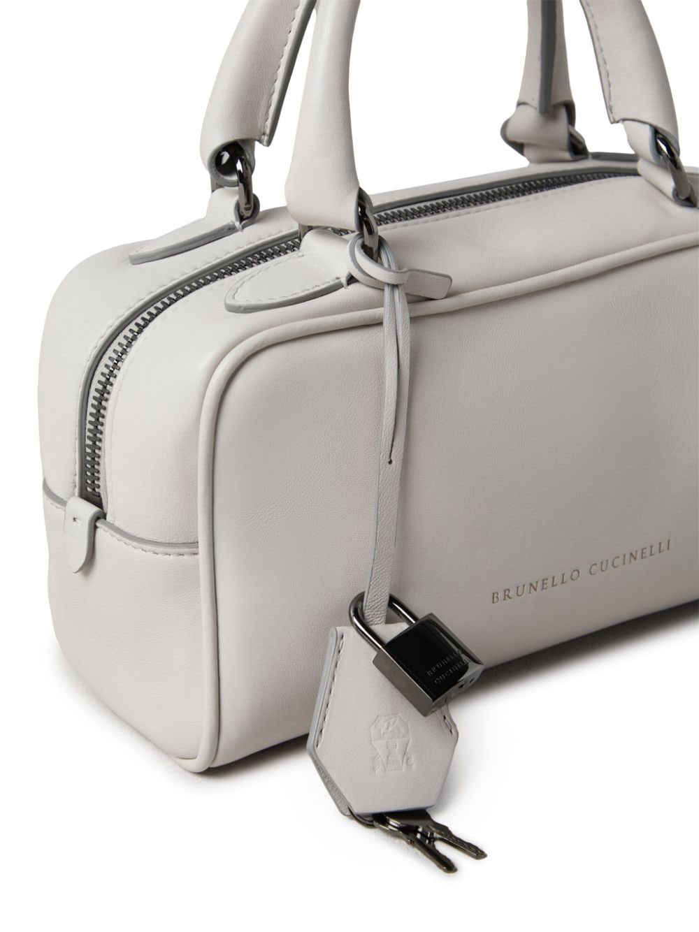 Front view with bag zipped and handles upright.