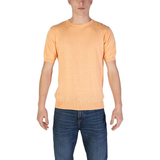 Man wearing Hamaki-Ho orange cotton T-shirt from fall/winter collection, 100% cotton, perfect for casual wear