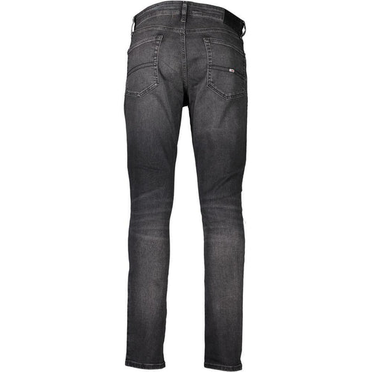 Back view of Tommy Hilfiger Austin slim tapered black cotton jeans featuring five pockets and logo, made with 20% recycled cotton.
