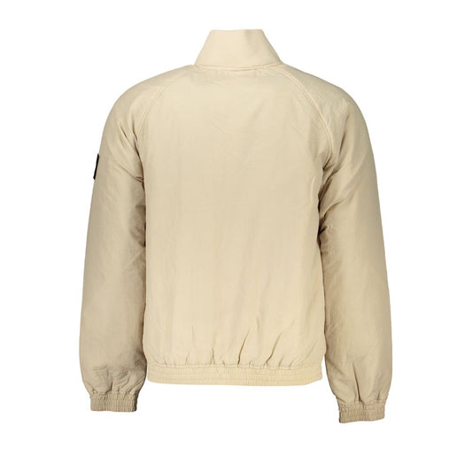 Calvin Klein chic beige long sleeve designer jacket with sharp print and logo, made of recycled nylon and polyester, eco-friendly fashion.
